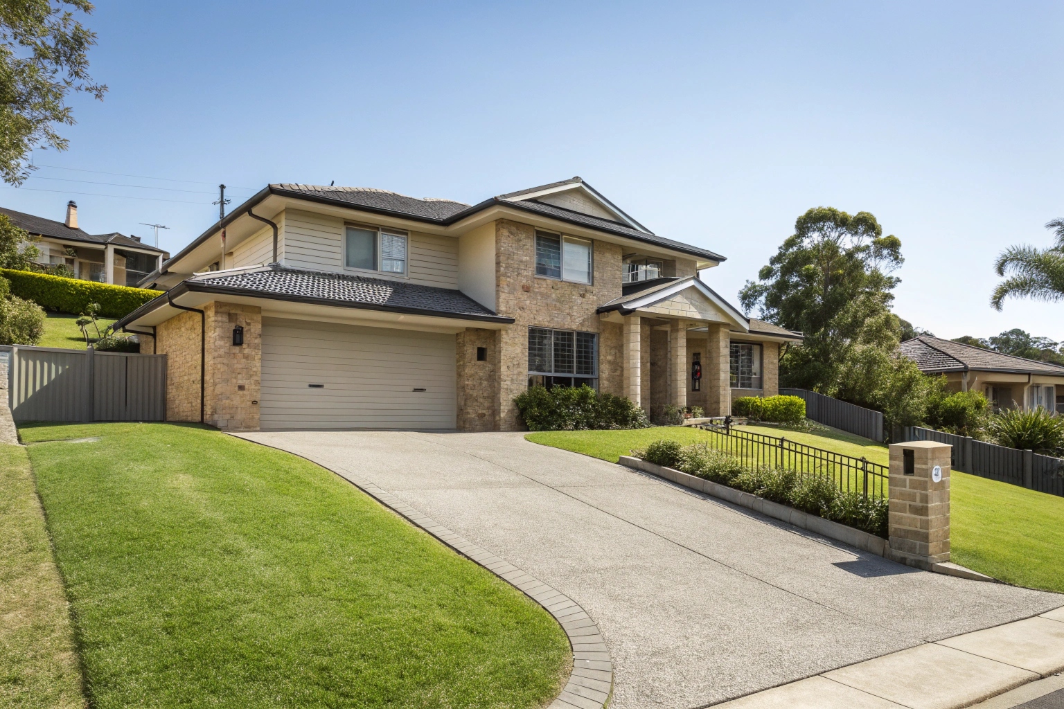 Modern family home with double garage on elevated block in Cardiff Heights