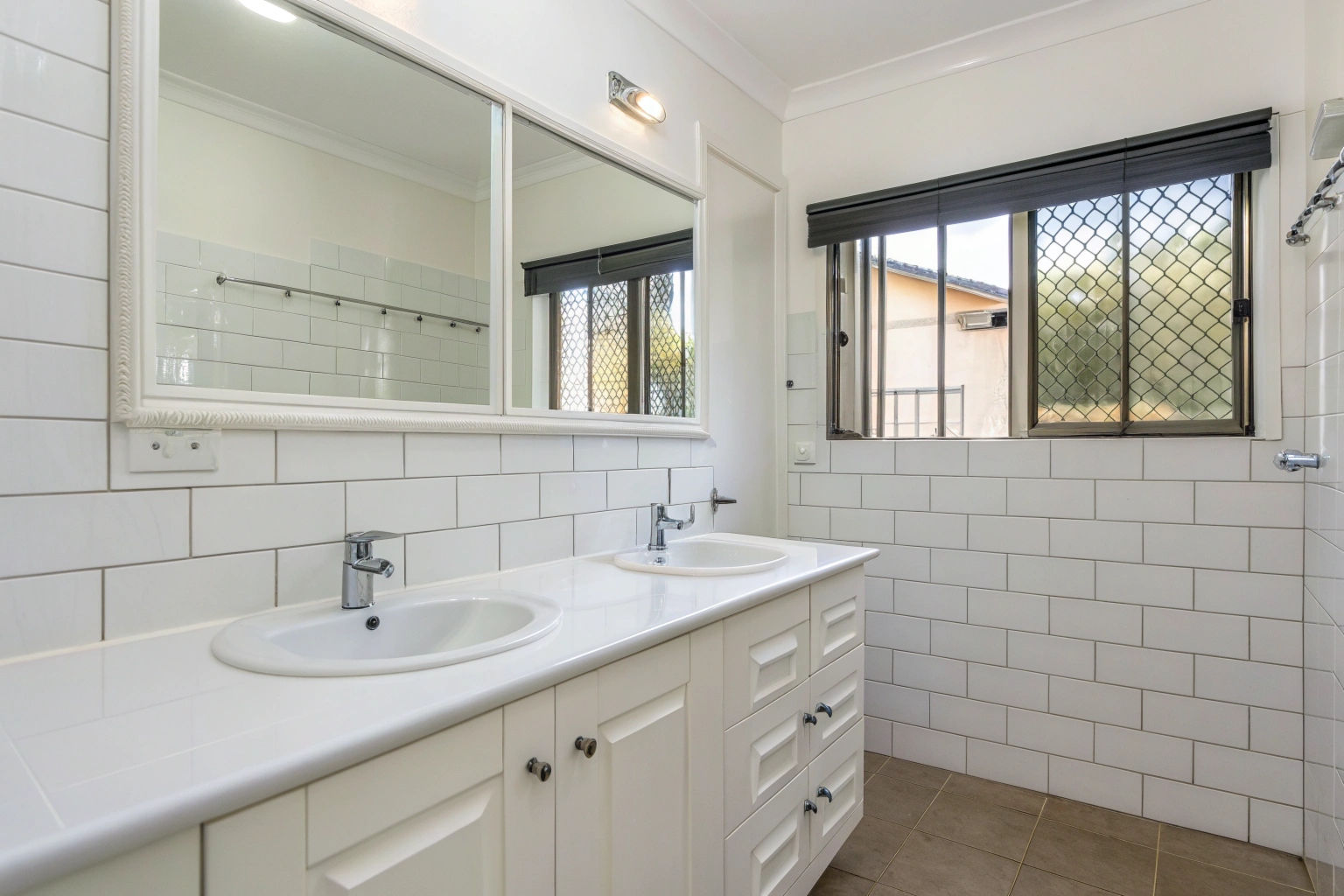 Spotless empty bathroom cleaned and sanitised ready for new occupants